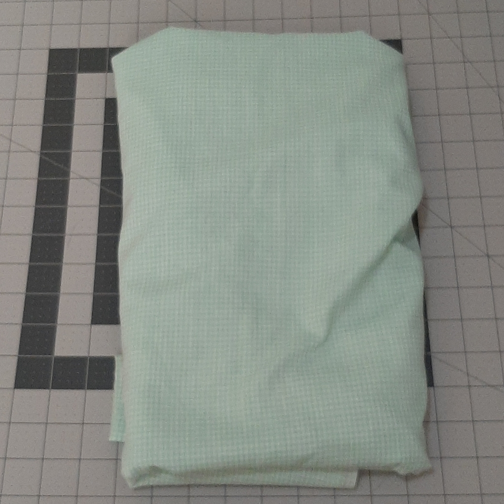 Light green checkered fabric